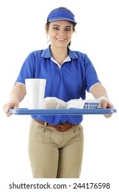 A pretty young fast food server bringing an order to the viewer.  On a white background.
