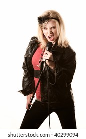 Pretty Young Female Blonde Singer Or Comedian With Microphone