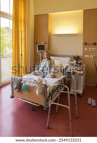 Similar – Foto Bild Betreuerin hilft älteren Patienten beim Aufstehen