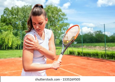 Pretty young girl injured during tennis practice, sport injuries - Powered by Shutterstock