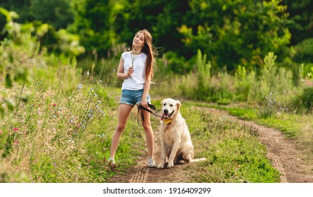 Pretty young girl with lovely dog