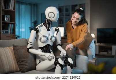 A pretty young girl orders her A.I.-equipped Domestic Robot to book her a flight. Concept of usefulness and versatility of A.I. 