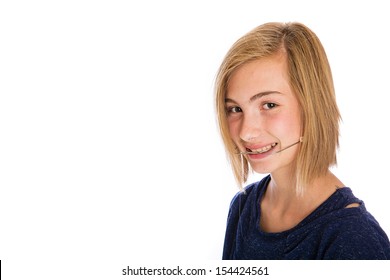 A pretty young girl wearing dental headgear - Shutterstock ID 154424561