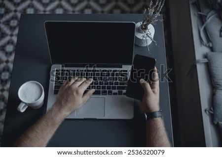Pretty Young Handsome Man Using Laptop in cafe, outdoor portrait business man, hipster style, internet, smartphone, office, Bali Indonesia, holding, mac OS, manager, freelancer , watch, cappuccino