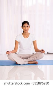 Pretty Young Indian Woman Yoga Exercise At Home