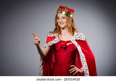 Pretty Young Queen In Red Dress Isolated On White