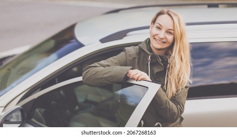 Pretty Young Woman By Her Car Ready For Her Daily Commute To Work