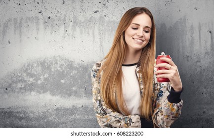 Pretty Young Woman Drinking A Coke