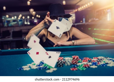 Pretty Young Woman In Elegent Blck Dress Gambling On Casino Green Table. Perfect Chance To Win