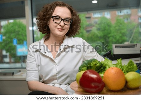 Similar – Image, Stock Photo Young smiling florist with a bouquet of ranunculus