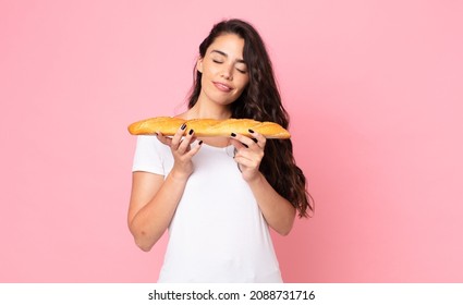 Pretty Young Woman Holding A Bread Baguette