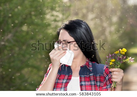 https://image.shutterstock.com/image-photo/pretty-young-woman-holding-flowers-450w-583843105.jpg