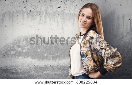 pretty young woman standing