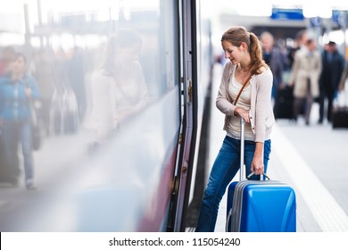 Pretty Young Woman At A Train Station