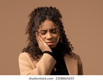 Pretty zoomer teenger girl with tooth pain on beige studio background. Toothache, dental problems, dentistry and medicine concept - Powered by Shutterstock