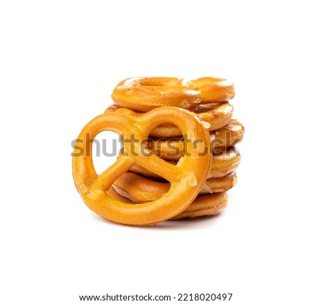 Pretzel Cookies Stack Isolated. Small Salted Pretzels, Crispy Beer Snack, German Brezel, Oktoberfest Symbol, Crusty Knot Shaped Pretzel Cookie on White Background