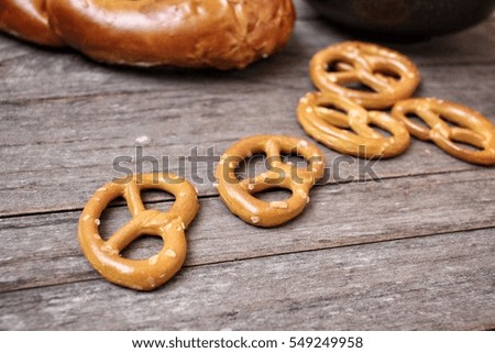 Similar – Image, Stock Photo Salted pretzels on wooden background