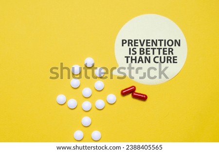 PREVENTION IS BETTER THAN CURE words on sticker with pills man on yellow background