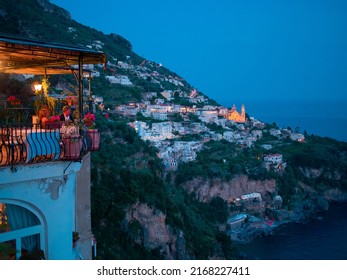 Priano Italy - June 4 2016: Priano Italy Restaurant Couple Enjoying Italian Food While Overlooking Amalfi Coast Sunset