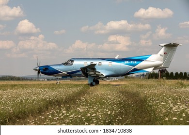 PRIBRAM, CZECH REPUBLIC - 12 August 2020. Pilatus PC-12 NGX, Single-engine turboprop modern business airplane. Blue Airplane on runway.