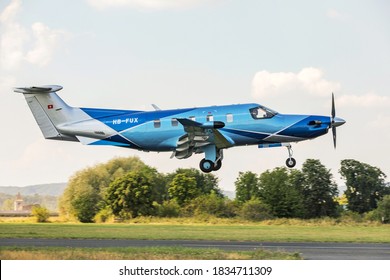 PRIBRAM, CZECH REPUBLIC - 12 August 2020. Pilatus PC-12 NGX, Single-engine turboprop blue airplane. The plane take off from a small airport.