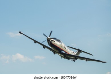 PRIBRAM, CZECH REPUBLIC - 26 June 2020. Pilatus PC-12 NG, Single-engine turboprop blue airplane. The Pilatus PC-12 NG torboprop aircraft flies in the blue sky with clouds.