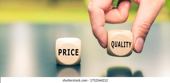 Price versus Quality. The cube with the word "quality" is selected by a hand.