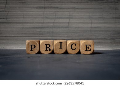 PRICE  word concept written on wood cube - Shutterstock ID 2263578041