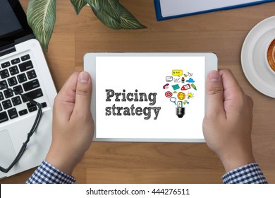 Pricing Strategy  Man Hand Tablet And Coffee Cup