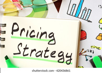Pricing Strategy Sign Written In A Notepad.