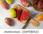 Prickly pears, exotic cactus fruits cut in halves, top view.