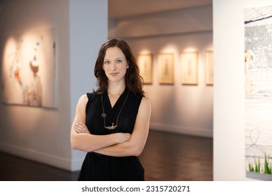 Pride, arms crossed and portrait of a woman at an art gallery for an exhibition. Creative, culture and a museum manager with management of paintings, collection and curator of pictures at a studio - Powered by Shutterstock