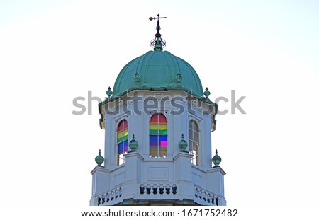 pride flags flying inside the dome of the Sheldonian Theatre Oxford designed by Sir Christopher Wren completed in 1669 part of the university