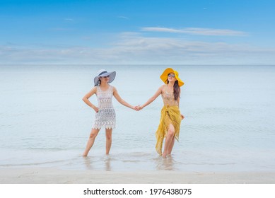 Pride And The LGBTQ Love Couple On Summer Beach. Bisexual And Homosexual Travel Together On Holiday.