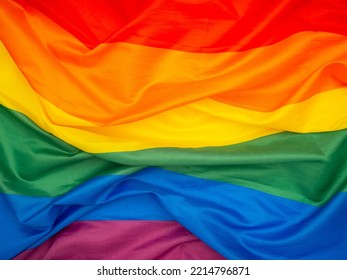 Pride Month. Top View Of The Rainbow Flag Or LGBT Flag. Full Frame Photo. Close-up Photo