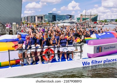 Pride Parade Of Lesbian, Gay, Bisexual, Transgender, Queer And Allies. LGBTQ People In Colorful Costumes Dancing, Smiling, Having Fun - Netherlands, Amsterdam, August 6, 2022.