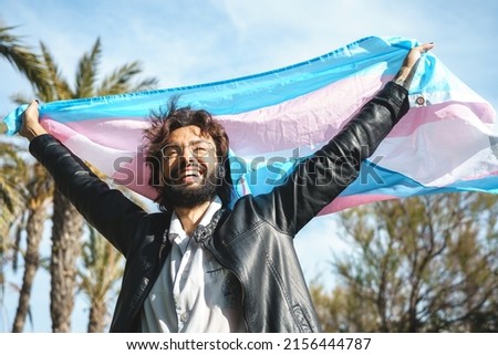 Pride trans person with transgender flag Foto stock © 