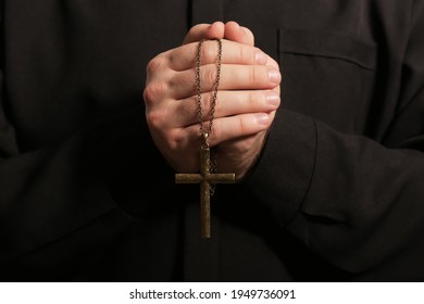 Priest In Cassock With Cross, Closeup View