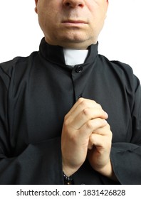 priest in a cassock on white background