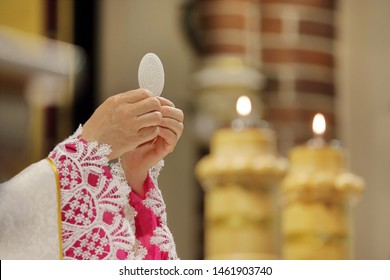 Priest celebrate mass at the church and empty place for text 