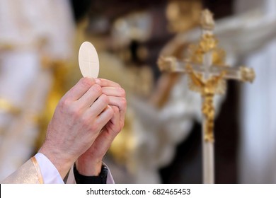 Priest celebrate mass at the church and empty place for text

