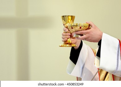Priest celebrate a mass and holy communion at the church - Shutterstock ID 450853249