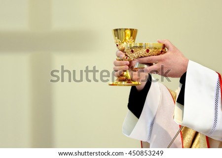 Priest celebrate a mass and holy communion at the church

