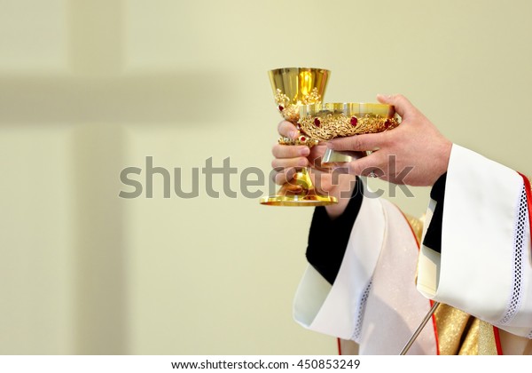 Priest celebrate a mass and holy communion at\
the church\
