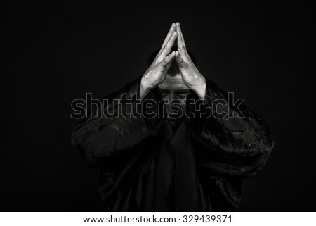 Similar – depressed man closes his eyes with his hands