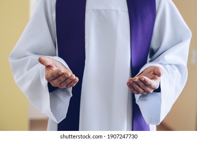 Priest Hands In Praying Or Blessing Gesture