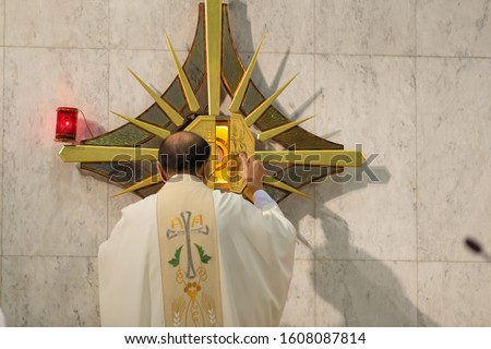 priest mass in a Christian church.Clergyman performing mass Christianity Roman Catholic To remember Jesus ordering his disciples while eating their last meal. In a Christian church