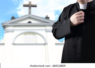 Priest Praying Before The Parish