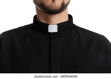 Priest wearing cassock with clerical collar on white background, closeup