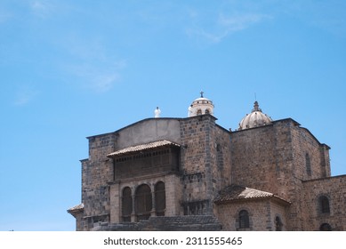 Priests at some hour on the roof of a Church in Cuzco, Perú - Shutterstock ID 2311555465
